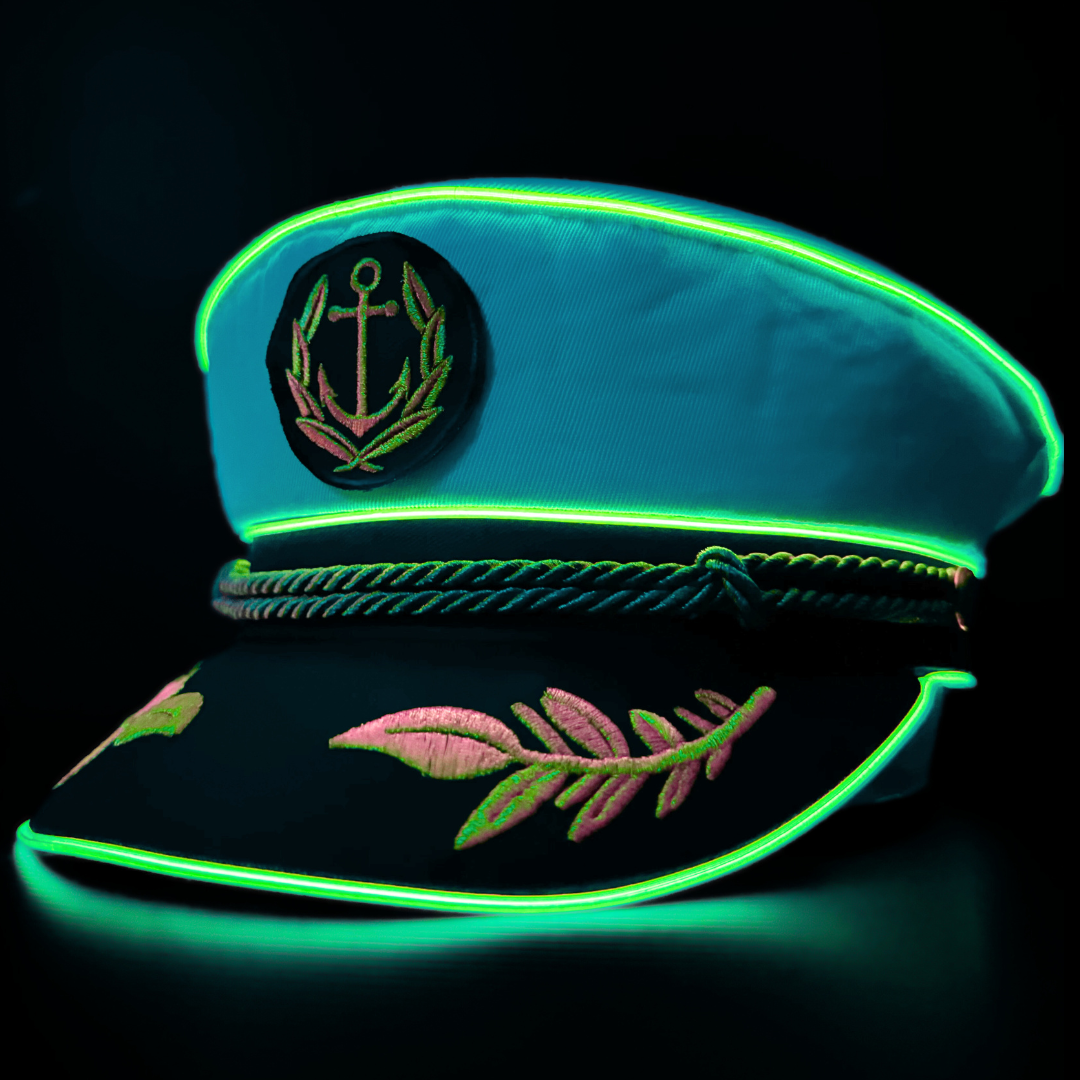 Snapback neon captain hat glowing in vibrant blue and green lights
